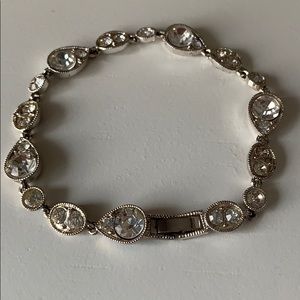 Silver tone bracelet with rhinestones